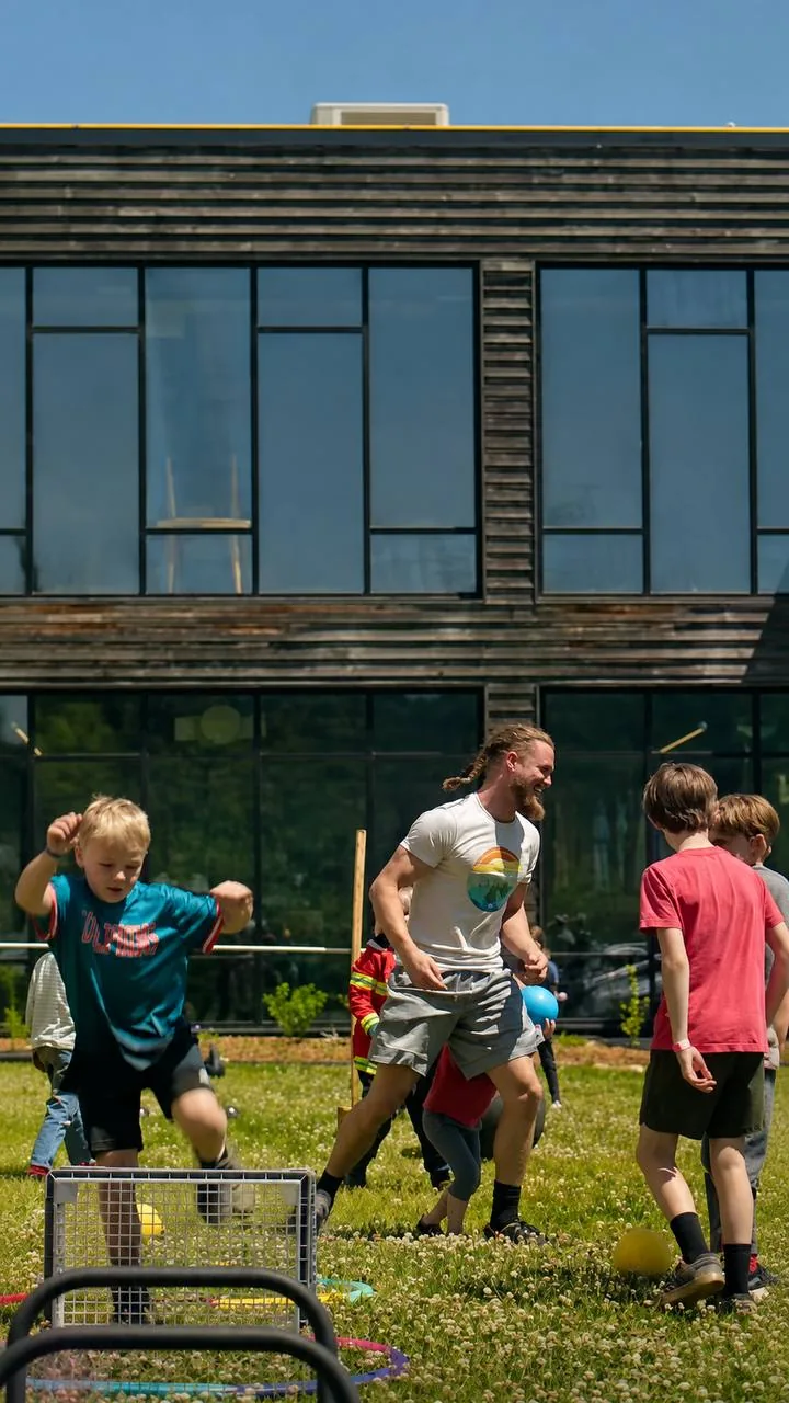 Youth athletic development session outdoors with coach-led play and movement games